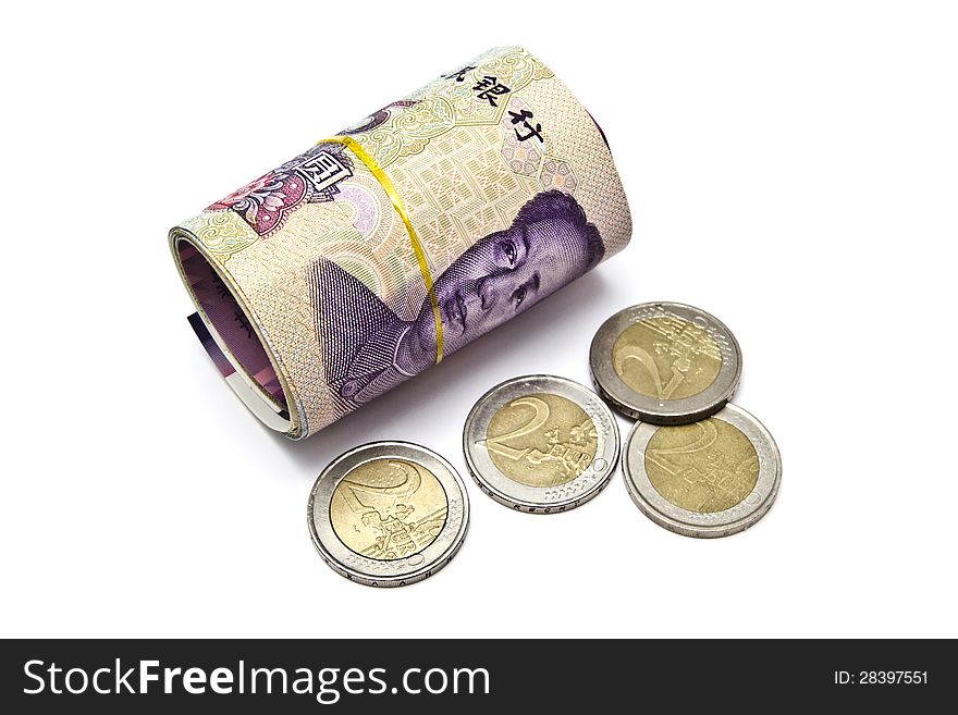 Roll of chinese money and euro coins
