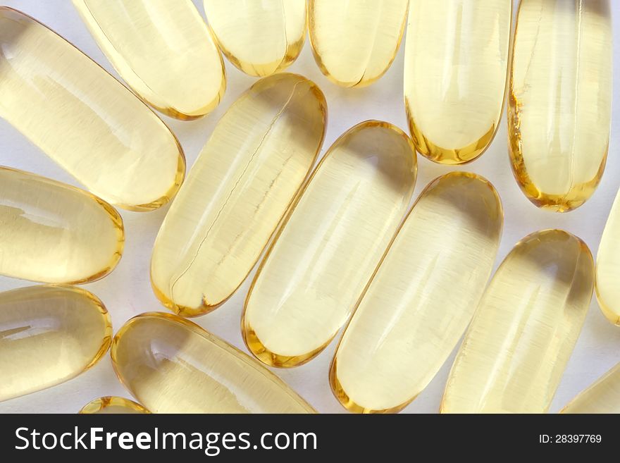 BAckground of omega-3 capsules closeup