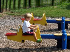 Young Boy At Playground Stock Photo Young Boy At Playground Stock Photo