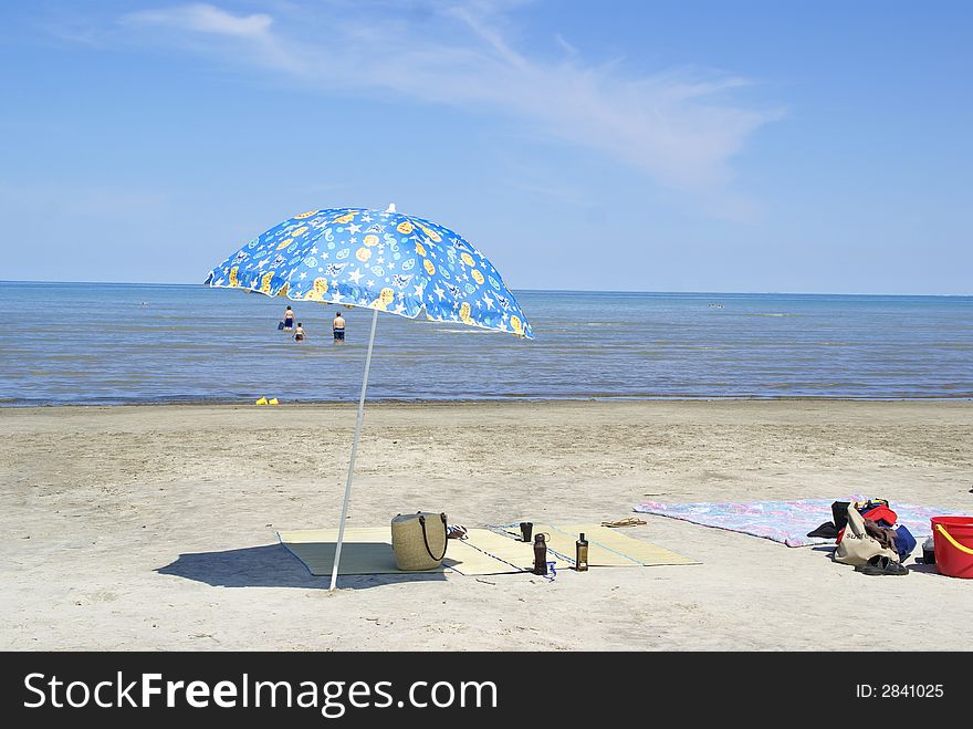 Photo of a beach with umbrella