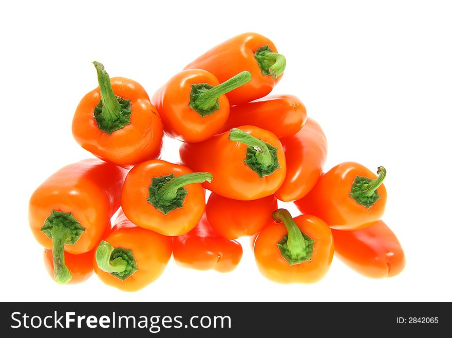 Stacked orange peppers