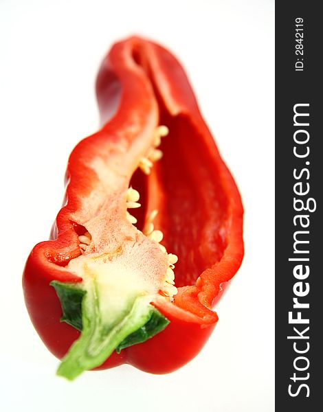 Sliced red bell pointed pepper, close-up, soft focus