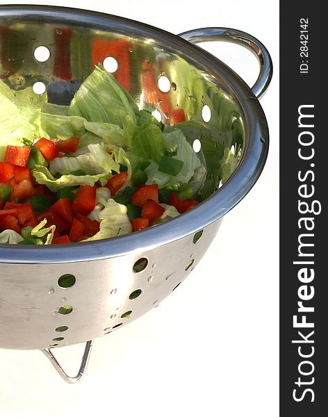 Salad In Strainer.