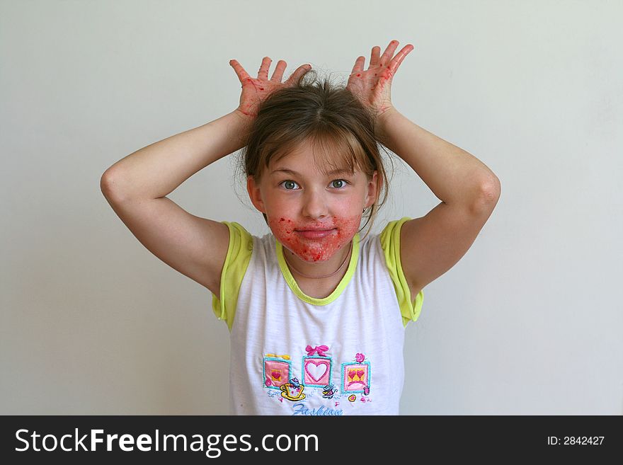 The girl was smeared with jam. The girl was smeared with jam