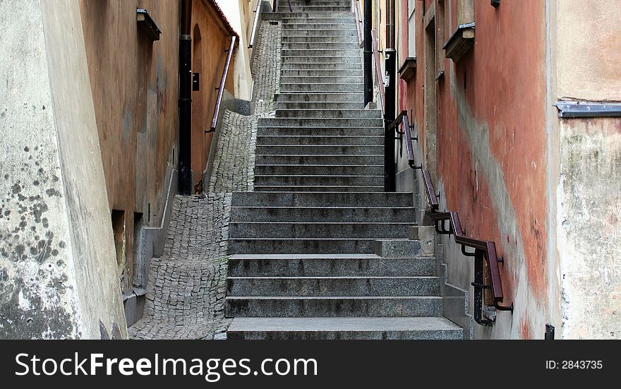 A narrow alley and stairway in Warsaw. A narrow alley and stairway in Warsaw
