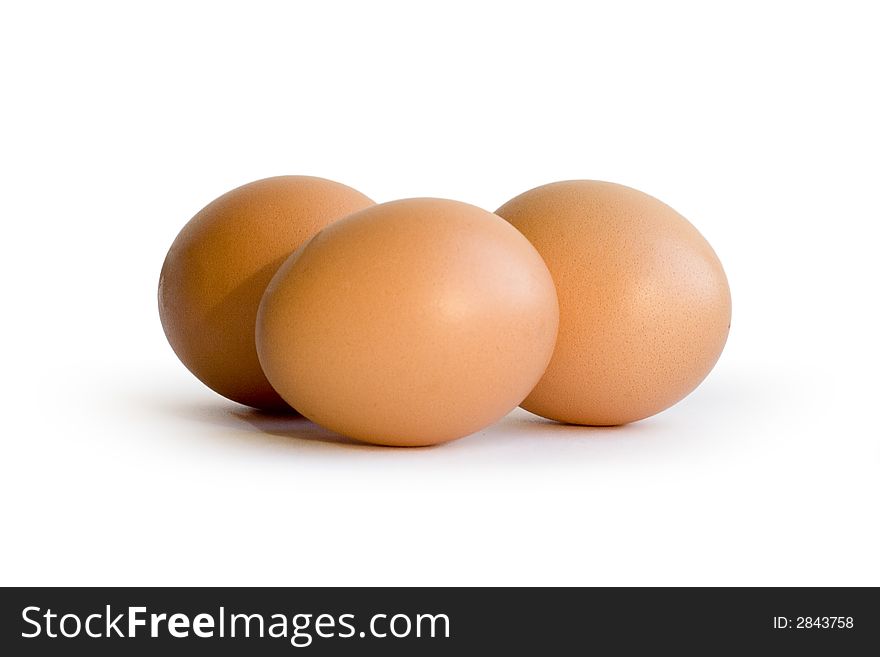 Three eggs on white background