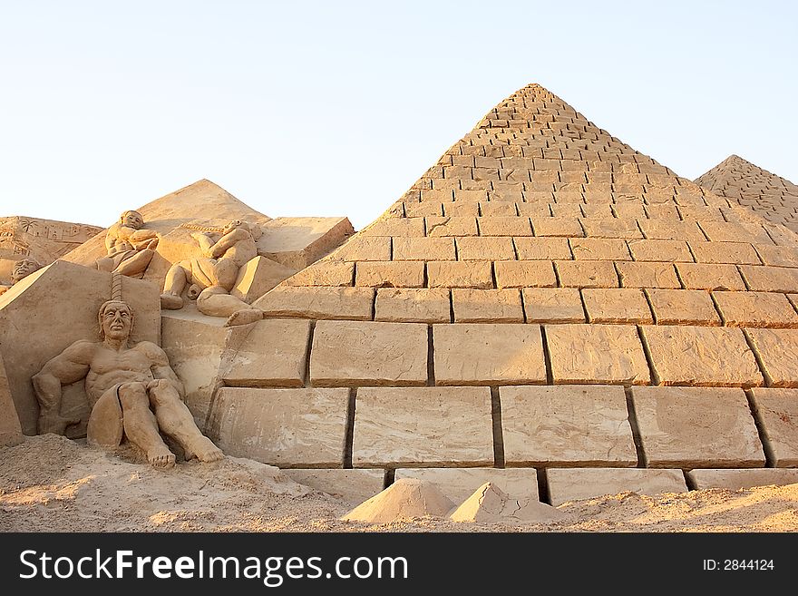 Ancient scenery with pyramids made from sand