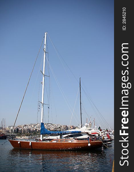 Luxurius wooden sailing yacht at marina. Luxurius wooden sailing yacht at marina