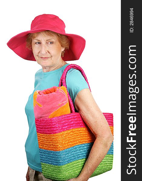 A senior dressed for the beach looking back over her shoulder. Isolated on white. A senior dressed for the beach looking back over her shoulder. Isolated on white.