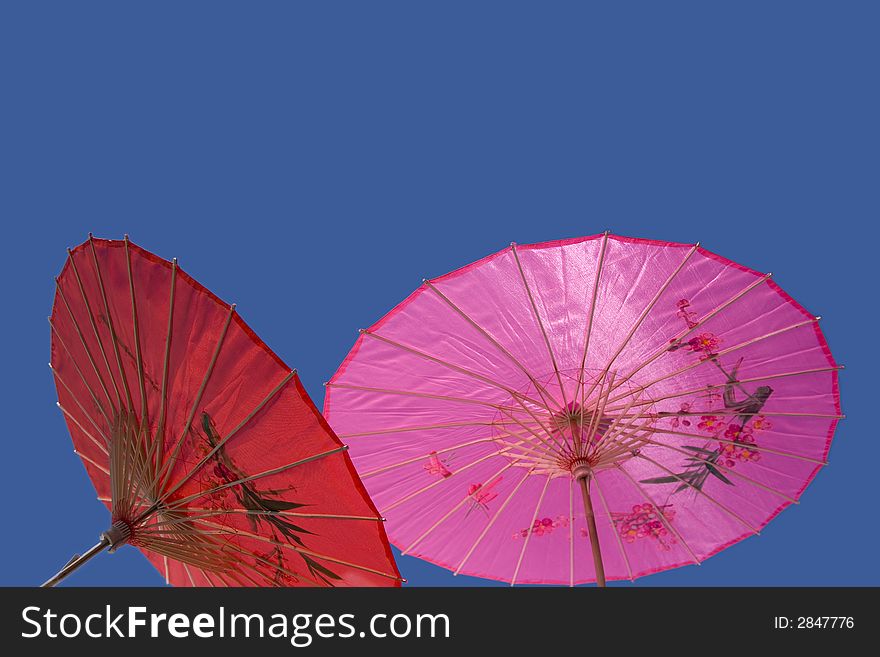 Red and Pink Parasol Against the Sky (70609739). Red and Pink Parasol Against the Sky (70609739)