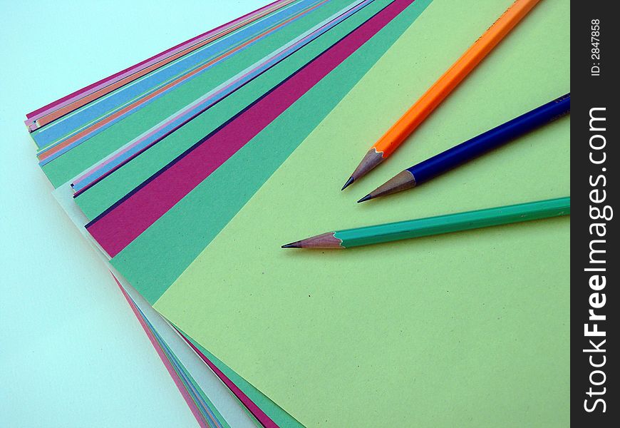 Colored paper and pencils for back to school. Colored paper and pencils for back to school