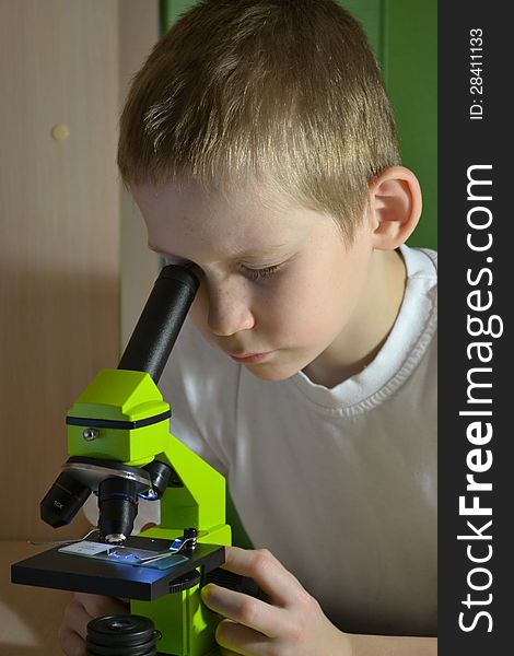 Teenager And Microscope