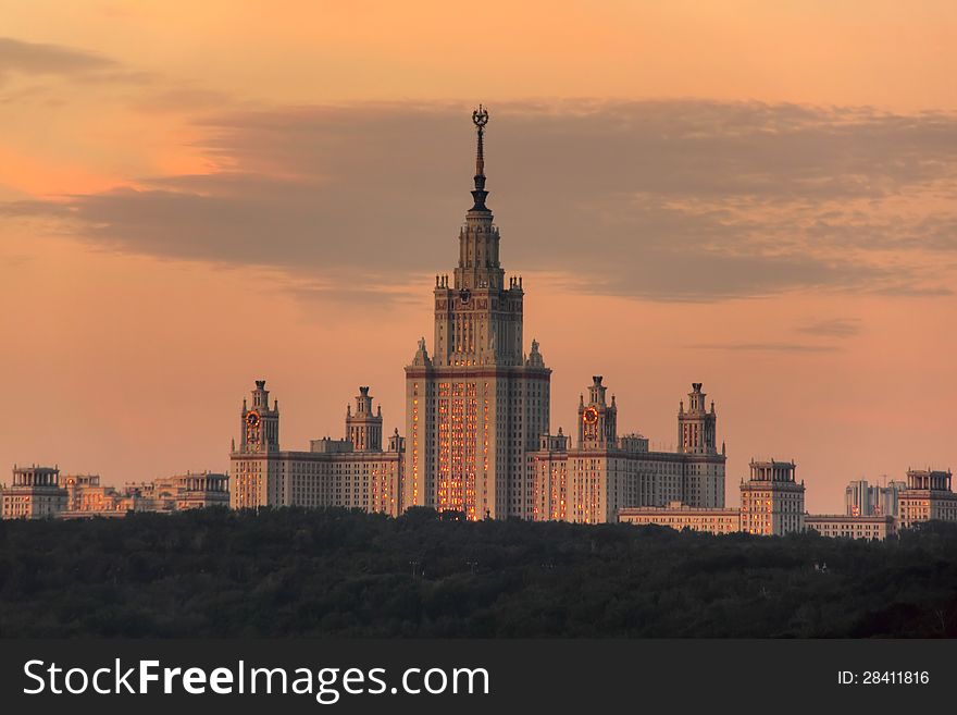 The building of the Moscow university against clouds. Summer evening. The building of the Moscow university against clouds. Summer evening.