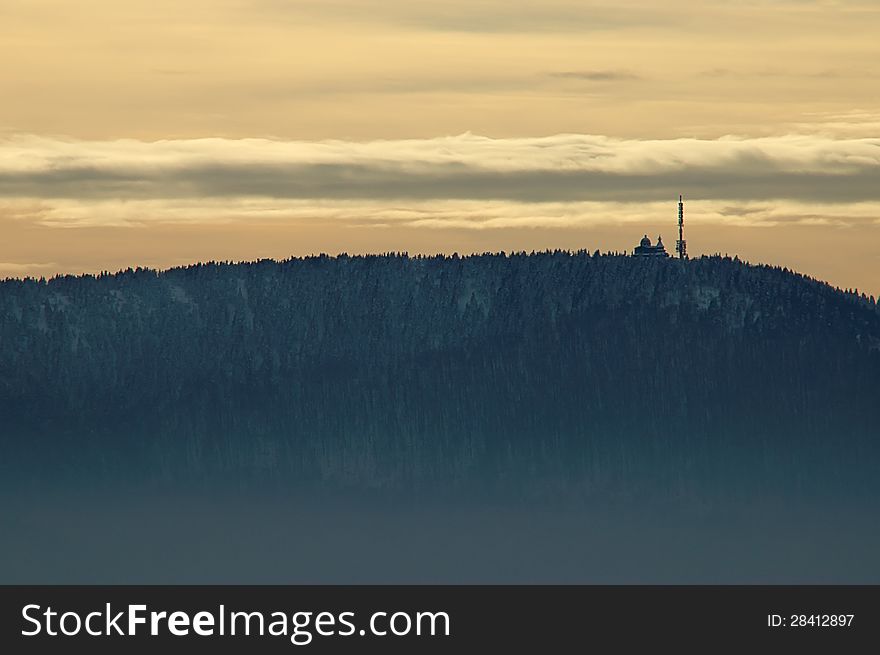 Winter mountain landscape with fog