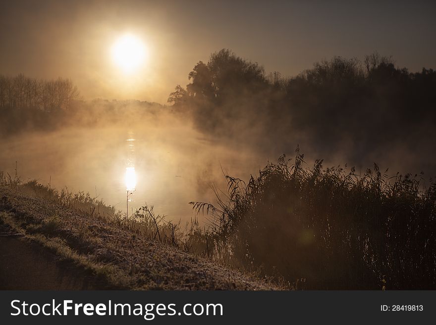 Sunrise over the water during the morning at the lake