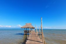Old Wooden Boat Dock, Going Far Out To Sea. Stock Photography Old Wooden Boat Dock, Going Far Out To Sea. Stock Photography