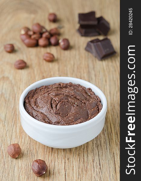 Walnut-chocolate Paste In A White Bowl