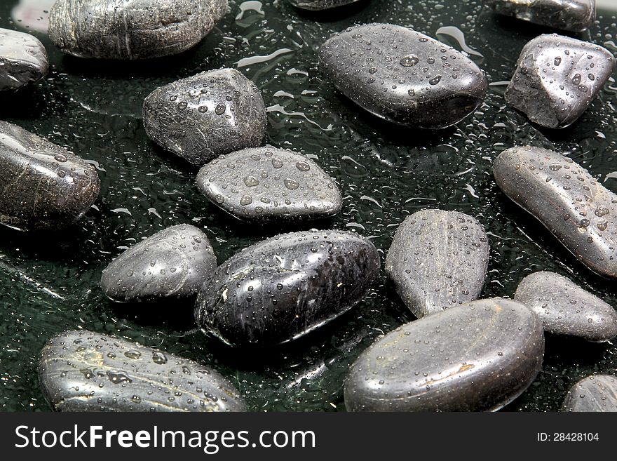 A background of black stones