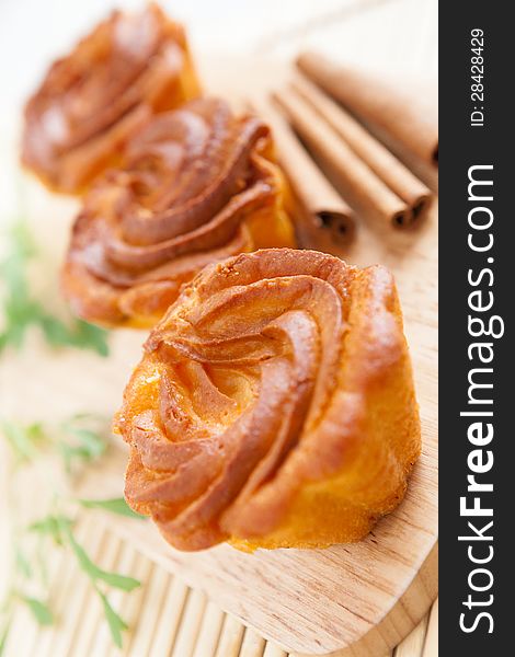 Brown cupcake on a wooden surface