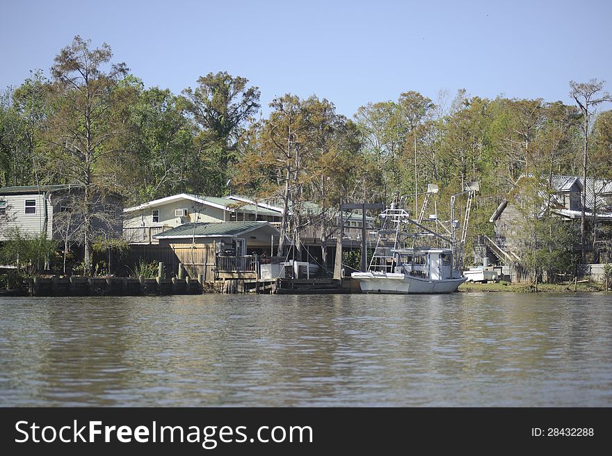 Many houses located by the river. Many houses located by the river