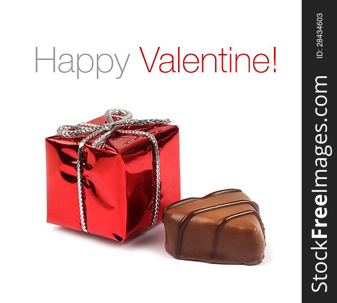 Small red Valentine present box with chocolate confection