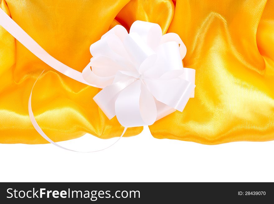 Yellow silk background header with a white bow for a blank form with some space for text. Yellow silk background header with a white bow for a blank form with some space for text