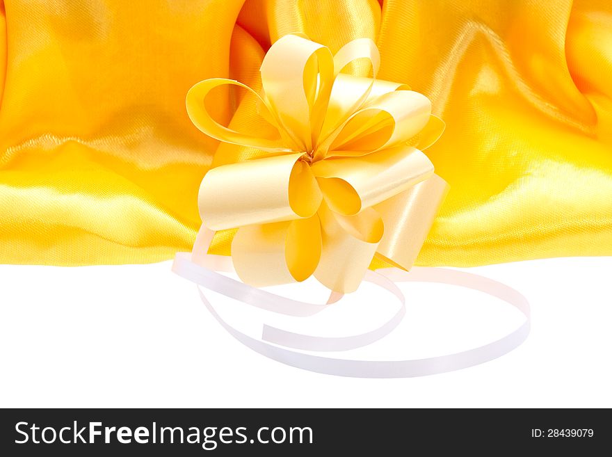 Yellow silk background header with a yellow bow for a blank form with some space for text. Yellow silk background header with a yellow bow for a blank form with some space for text