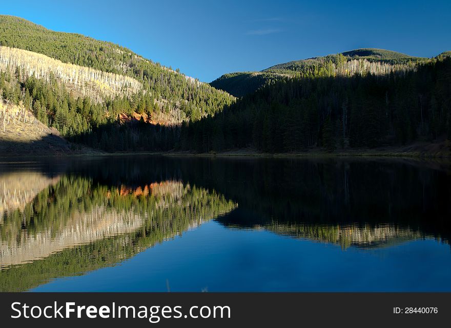 A reflective Mountain lake in Colorado. A reflective Mountain lake in Colorado