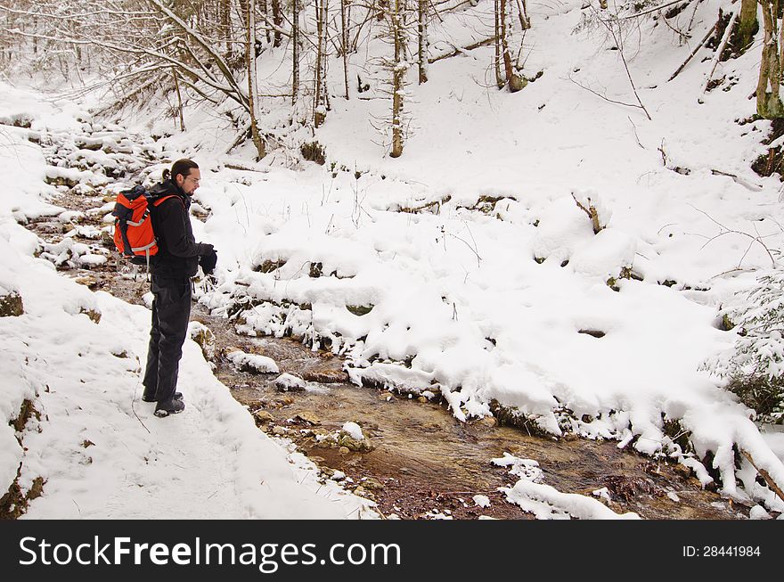 Man Hiking Near A River