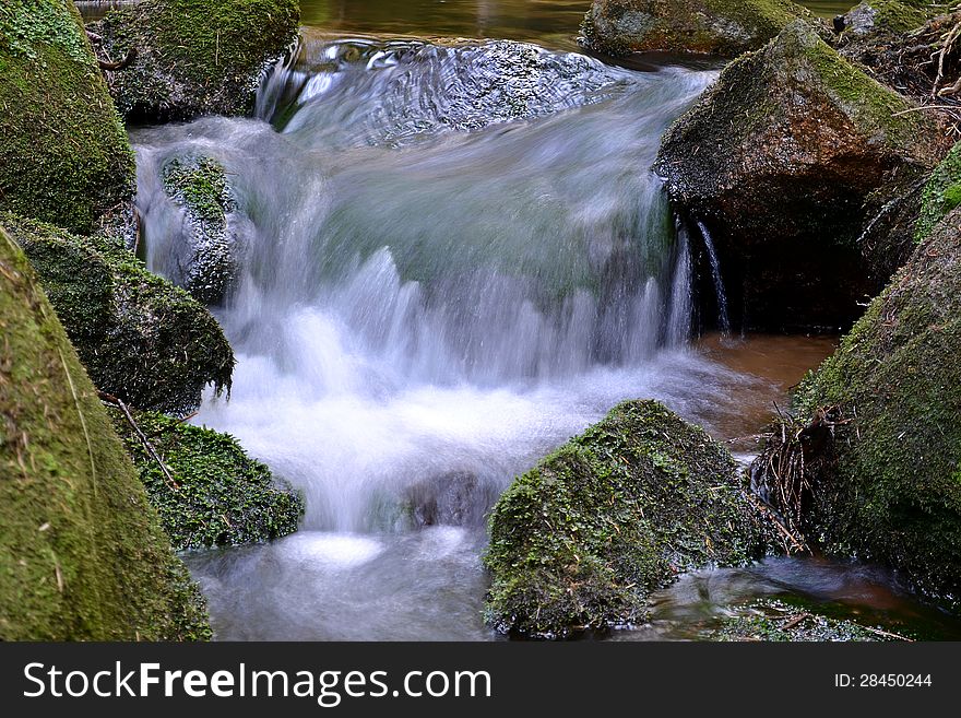 Waterfall on a mountain stream in the Harz National Park
