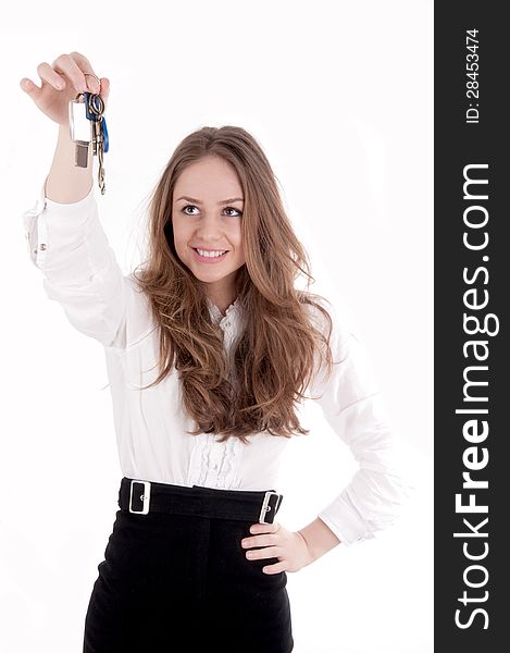 Young girl holding car key on isolated  on white background