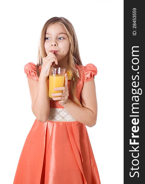 Portrait of happy little girl drinking orange juice. Portrait of happy little girl drinking orange juice