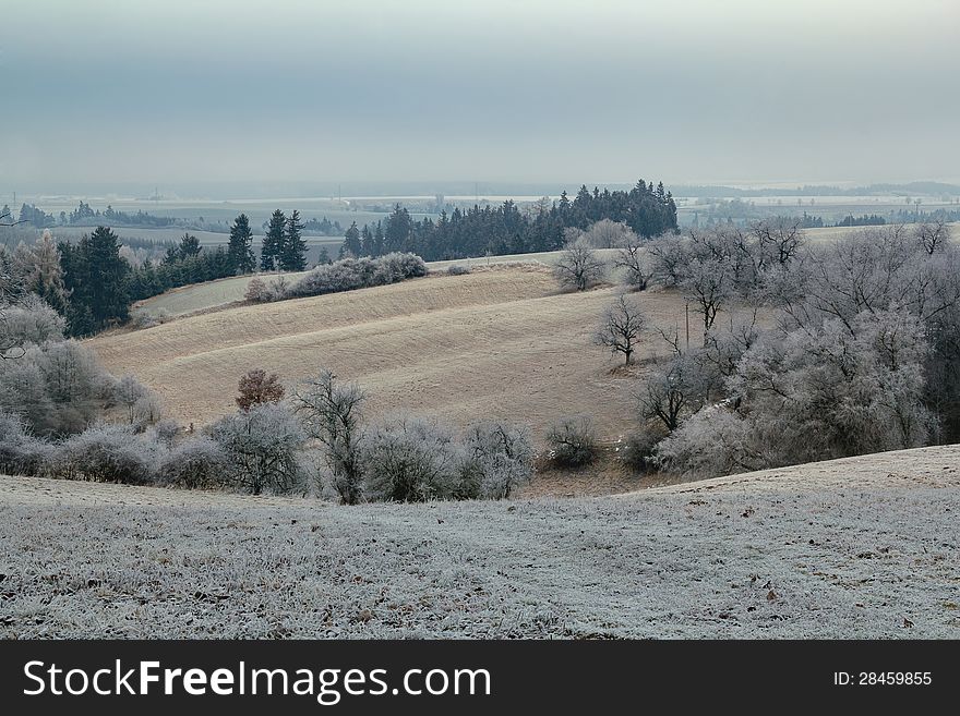 Overcast winter scenery with frozen landscape in winter. Overcast winter scenery with frozen landscape in winter