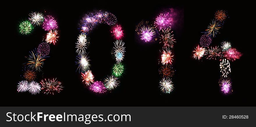 Fireworks in the shape of two thousand and fourteen