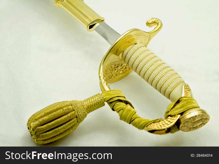 Navy officers sword hilt made of yellow metal. Navy officers sword hilt made of yellow metal