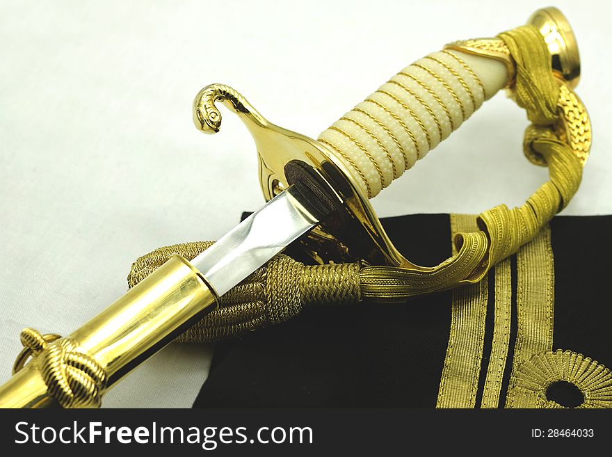 Navy officers sword hilt made of yellow metal. Navy officers sword hilt made of yellow metal