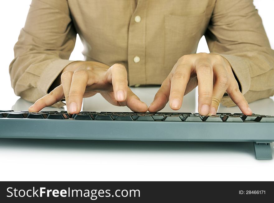 Woman hand typing on black computer keyboard over white background. Woman hand typing on black computer keyboard over white background