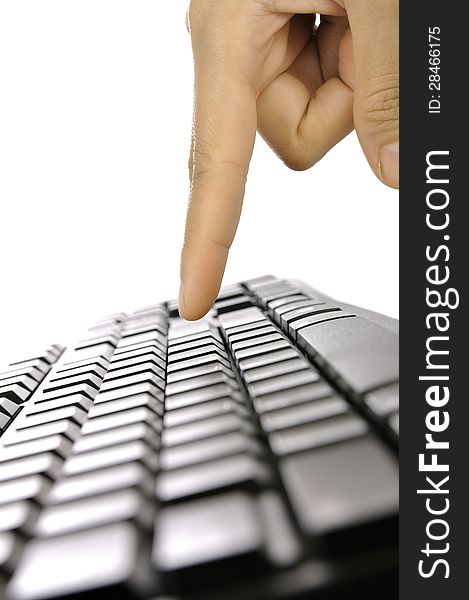 Woman hand typing on black computer keyboard isolated over white background. Woman hand typing on black computer keyboard isolated over white background