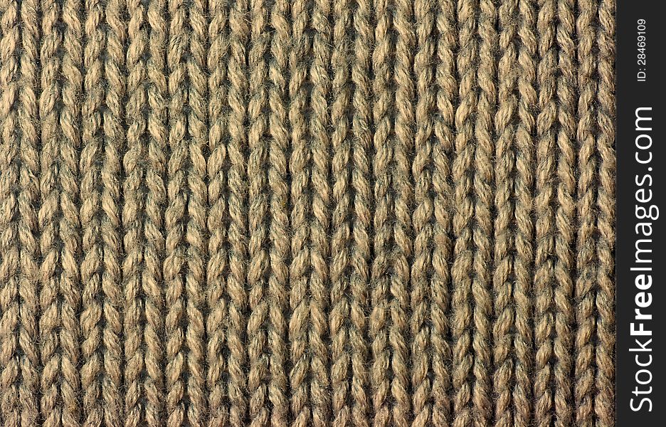 The structure of a knitted fabric closeup. The structure of a knitted fabric closeup