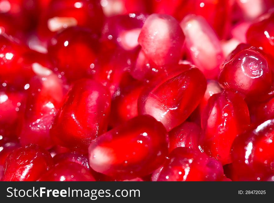 Pomegranate seeds background - macro view