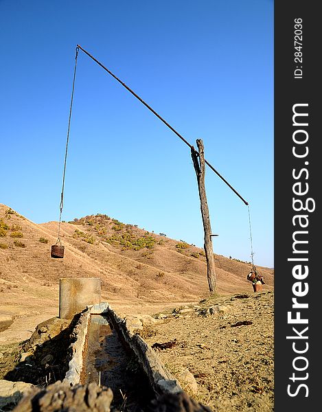 An old fountain in mountains