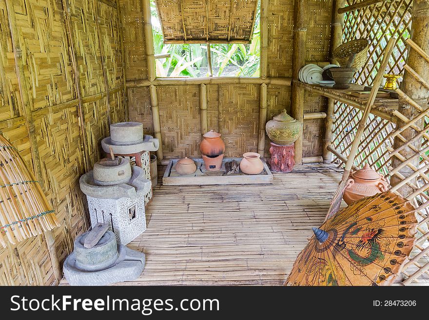 Antique Thai Style Kitchen With A Lot Of Earthenware At Bamboo Cottage