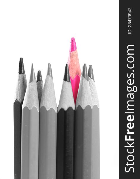 Pink color pencils, beyond black on white another pencils, isolated on white