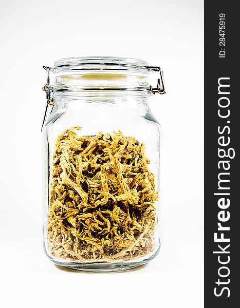 Dried shredded pork in glass bottle  on white background