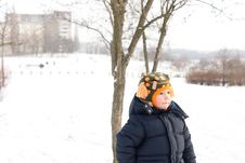 Small Boy Outdoors In Winter Snow Royalty Free Stock Photography