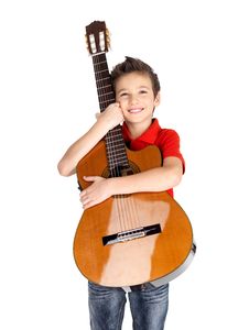 Smiling Boy Holding Acoustic Guitar Stock Images Smiling Boy Holding Acoustic Guitar Stock Images