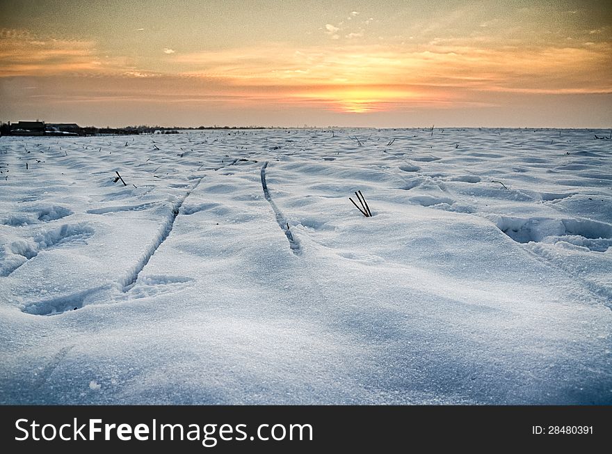 Snow field at sunset HDR