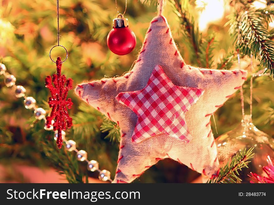 Photo of christmas decorations on xmas tree. Photo of christmas decorations on xmas tree