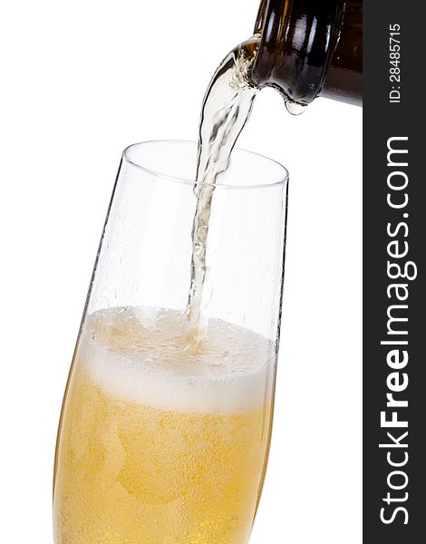 Bottle and glass of champagne  on white background