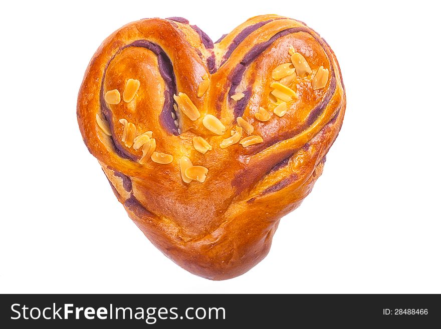 Heart shaped bread with love on white background (clipped path)